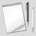 Vertical clean blank spiral notebook with curled sheet and ballpoint pens automatic. Royalty Free Stock Photo