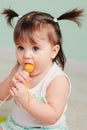 Vertical close up indoor easter portrait of cute happy baby girl Royalty Free Stock Photo