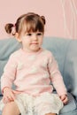 Vertical close up indoor portrait of cute happy baby girl Royalty Free Stock Photo