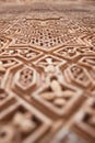 Vertical close-up picture of detail of Islamic, Moorish, tile work at Alhambra, Granada, Spain. Great background texture. travel