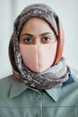 Middle Eastern Businesswoman Wearing Mask