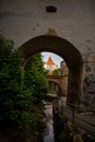 Vertical closeup of a Bastionul Graft with a building seen from Royalty Free Stock Photo