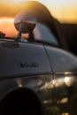 Vertical closeup of the details on a speedster fiction car