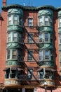 Vertical closeup of a high abstract building on Hanover street in Boston