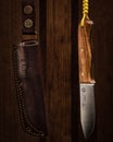 Vertical closeup of a joker campero knife and sheath