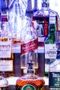 Vertical closeup of liqueur bottles with good lighting.