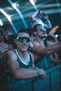 Vertical closeup of a male with shield sunglasses enjoying Electric Love Music Festival