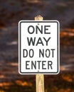 Vertical closeup of a one way-do not enter warning street sign Royalty Free Stock Photo