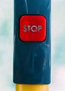 Vertical closeup of red stop button-bell in a bus Royalty Free Stock Photo