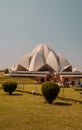 Vertical closeup sepia of the Bahai Lotus Temple in Delhi, India, on a sunny day