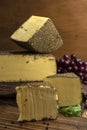 Vertical closeup shot of blocks of gourmet Beaufort cheese