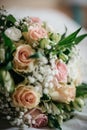 Vertical closeup shot of a bouquet of delicate flowers.
