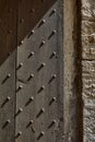 Vertical closeup shot of old gates to a castle in Aigues-Mortes, Gard, France Royalty Free Stock Photo