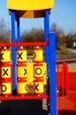 Vertical closeup shot of a playboard with X and O in the playground Royalty Free Stock Photo