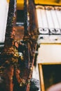 Vertical closeup shot of the rusty and old handrailings and fences of a building Royalty Free Stock Photo