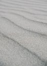 Vertical closeup shot of sand texture background Royalty Free Stock Photo