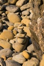 Vertical closeup shot of the stack of pebbles for backgrounds - balance