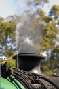 Vertical closeup shot of the steam getting out of a tube on a wagon Royalty Free Stock Photo