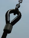 Vertical closeup shot of a steel thimble against the blue sky Royalty Free Stock Photo