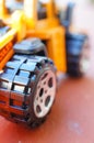 Vertical closeup shot of the wheel of a toy car Royalty Free Stock Photo