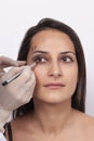 Vertical closeup shot of a woman preparing her face for a plastic surgery  procedure  professional Royalty Free Stock Photo