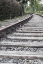 Vertical closeup shot of wooden train tracks Royalty Free Stock Photo