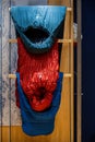 Vertical closeup of sleeping bags hanging in a store at the Alpine fair in Innsbruck, Austria