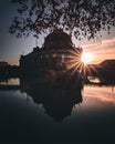 Vertical closeup of sunrise over the Bode museum in Berlin during autumn, purple sky background