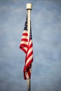 Vertical closeup of the United States of America Flag on Pole Royalty Free Stock Photo