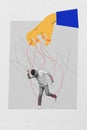 Vertical collage creative poster black white effect unhappy unconscious puppet marionette young man doodle hand control
