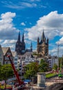 Vertical of the Cologne Cathedral in Germany on a cloudy, sunny day