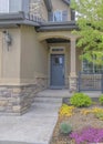 Vertical Colorful front yard garden of a house with contemporary traditional style Royalty Free Stock Photo