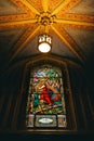 Vertical of a colorful glass painting, stained glass in Notre Dame Cathedral Basilica in Ottawa Royalty Free Stock Photo