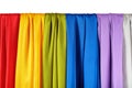 Vertical colorful satin curtains isolated on white Royalty Free Stock Photo