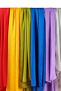 Vertical colorful satin curtains isolated on white Royalty Free Stock Photo