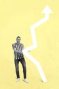 Vertical creative collage of crazy positive person touch glowing up arrow isolated on drawing yellow background