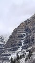Vertical crop Stunning Bridal Veil Falls in Provo Canyon with frozen water on the rugged slope Royalty Free Stock Photo