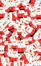 Vertical 3D image of multiple and different sizes of Santa crosses stacked and overlapping chaotically, background texture, visual