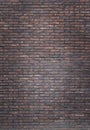 Vertical dark red brick wall background, wallpaper. Red bricks pattern, texture.. Vignette background Royalty Free Stock Photo