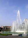 Vertical day view of a circular fountain in the Magic Water Circuit of Lima