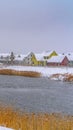 Vertical Daybreak homes around Oquirrh Lake seen in winter Royalty Free Stock Photo