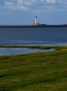 Vertical distant shot of famous Westerhever lighthouse located in St. Peter-Ording, Germany