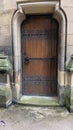 Vertical door gothic style wood and metal