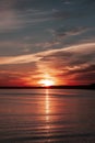 Reddish sunset over calm sea