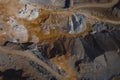 Vertical drone panorama of open mine or quarry on a sunny day at Verd, Slovenia. Visible terraces and vast surface of sand and Royalty Free Stock Photo