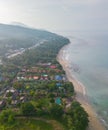 Vertical drone shot of buildings on a tropical beach of Andaman sea on Koh Lanta island, Thailand Royalty Free Stock Photo