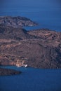 Vertical drone shot of a Tourist Yachts Moored near the Nea Kameni Volcano island in the Aegean Sea