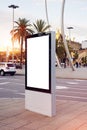 Vertical empty billboard placeholder template on the city bus stop, information banner template, space for mockup layout. Royalty Free Stock Photo