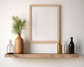 Vertical empty mock up poster frame on wooden shelf. Interior design of modern living room with white wall and home decor pieces.