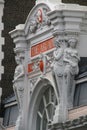 Vertical exterior shot of the historic, classic arcade building in London